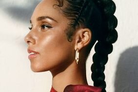 Alicia Keys wears a braid and pink dress for InStyle's June cover