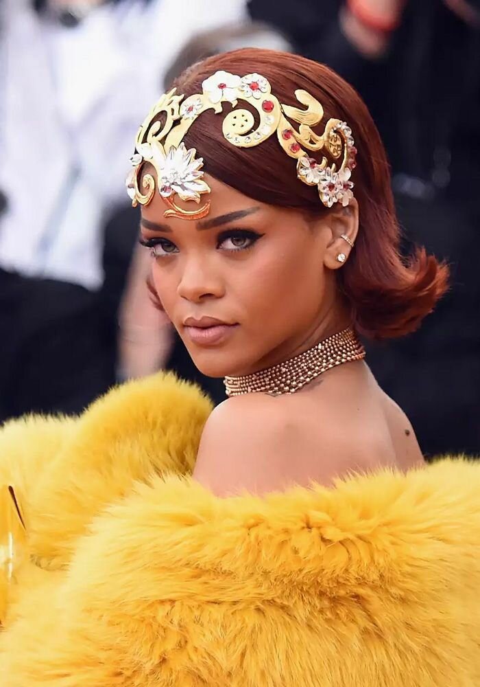 Rihanna at the Met gala wearing a short flipped-out bob.