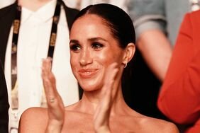 Meghan Markle Clapping in Teal Leather Dress at Closing Ceremony of 2023 Invictus Games in DÃ¼sseldorf, Germany