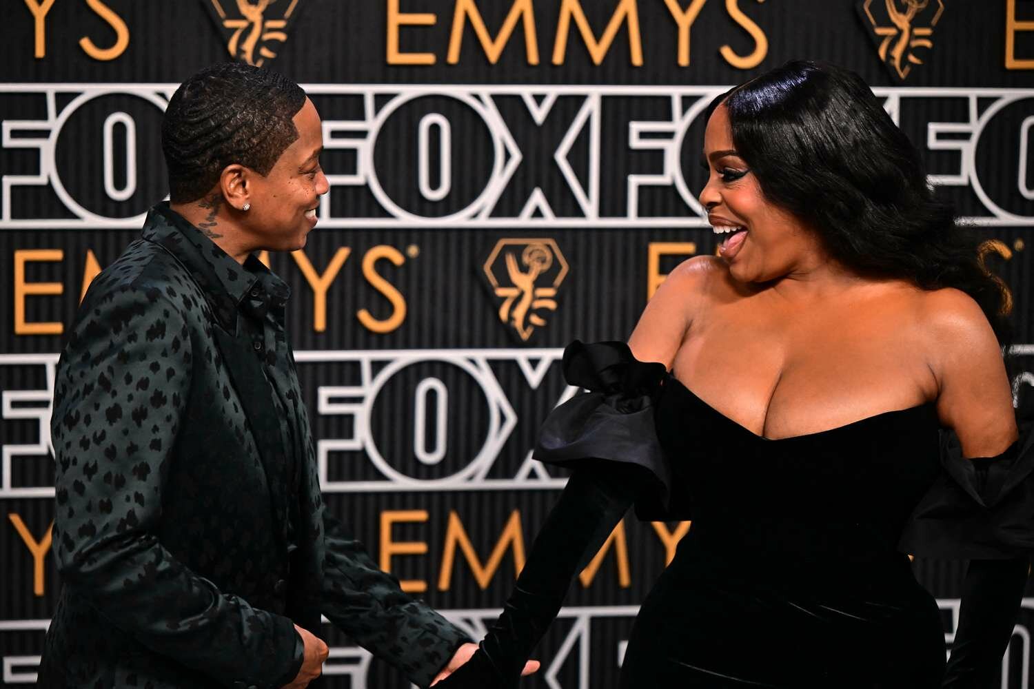 Niecy Nash and her wife at the 2024 Emmys red carpet