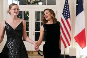 Jennifer and Violet Garner Smiling and Holding Hands at White House