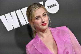 Lili Reinhart Soft Smile Pink Suit Red Lip Blonde Hair in Ponytail With Face-Framing Strands Women in Film Presents 2023 WIF Honors 
