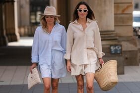 Two women wear wear cute vacation outfits.