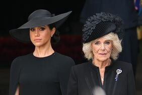 Meghan Markle and Queen camilla attend queen elizabeth's funeral in black outfits
