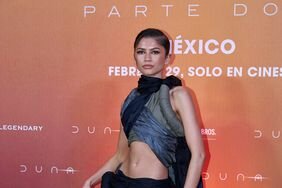  Zendaya Posing With Arms at Side in Avant-Garde Look With Wrap Crop Top and Maxiskirt 'Dune: Part Two' Mexico City Photo Call 