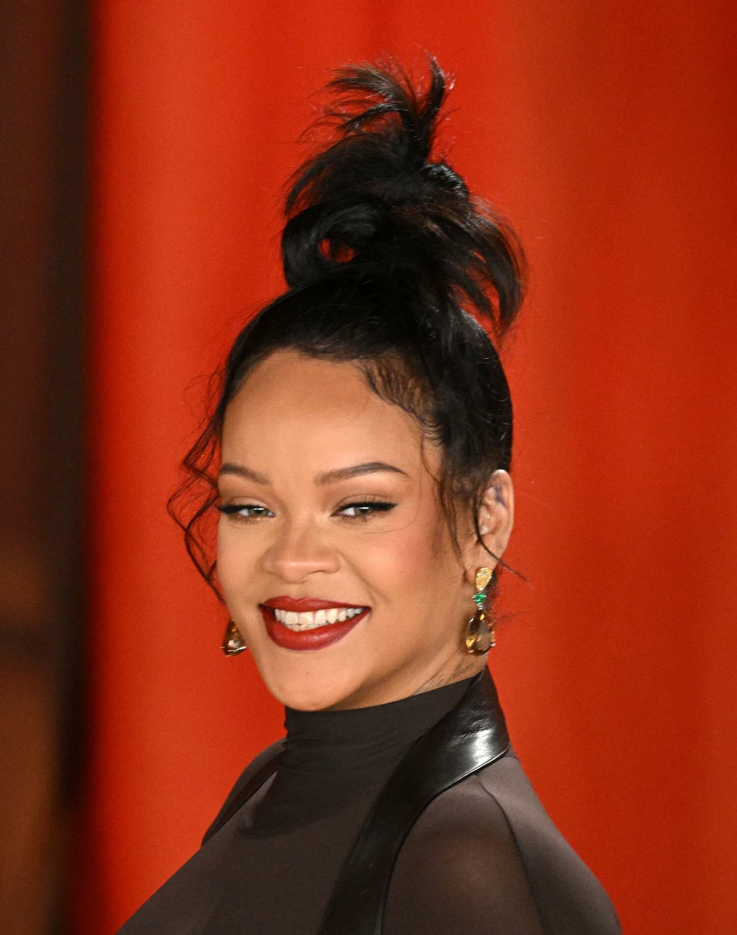 Rihanna with a top knot Rihanna hairstyles