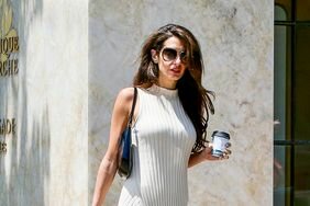 Amal Clooney in Ribbed Cream-Colored Dress and Adidas Sneakers