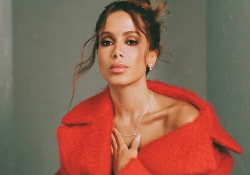 Anitta wears red jacket on cover of InStyle's Fall Fashion Issue