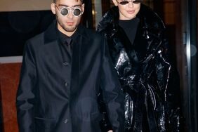 Zayn Malik and Gigi Hadid in all-black outerwear and sunglasses
