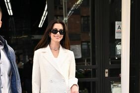 Anne Hathaway in White Jacket and Matching Cargo Pants Posing New York City Nov. 27Anne Hathaway in White Jacket and Matching Sheath Dress New York City Nov. 27