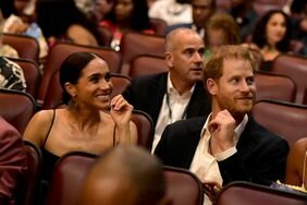 Prince Harry Meghan Markle Sitting in Theater Smiling Looking Off to the Side âBob Marley: One Loveâ Premiere in Jamaica 