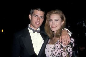 Tom Cruise and Mimi Rogers in '80s formalwear with their arms around each other