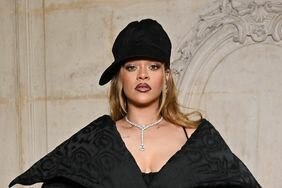 Rihanna Posing Holding Hands at Her Midsection Black Suit and Pencil Skirt Dior Haute Couture Spring-Summer 2024