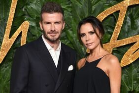 Victoria and David Beckham Arms Around Each Other Step-and-Repeat at 2018 Fashion Awards