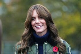 Kate Middleton wears a blue turtleneck with a quilted coat