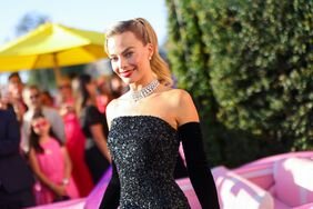 Margot Robbie Black Gown and Gloves Solo in the Spotlight Doll Los Angeles 'Barbie' Premiere