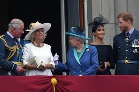 King Charles, Queen Camilla, Queen Elizabeth, Meghan Markle, Prince Harry on Balcony Buckingham Palace at at 2018 Royal Air Force Flypast 