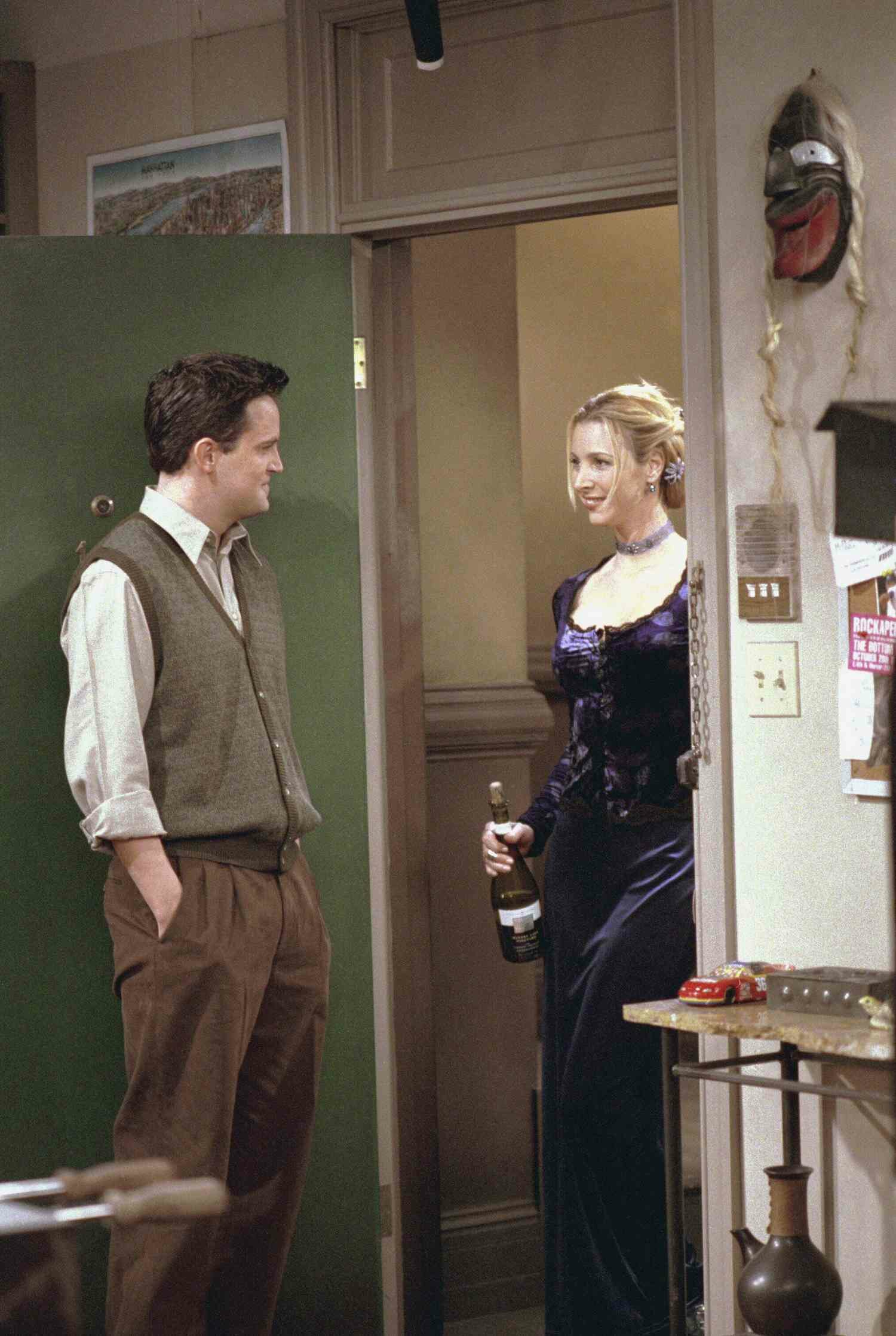Chandler Bing and Pheobe Buffay In Doorway of Chandler and Joey's Apartment