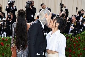 Kourtney Kardashian Travis Barker kissing on Met Gala Red carpet