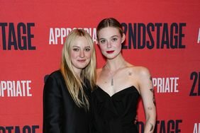 Dakota and Elle Fanning Matching Black Outfits Hands Around Each Other Second Stage Opening Night of "Appropriate" 