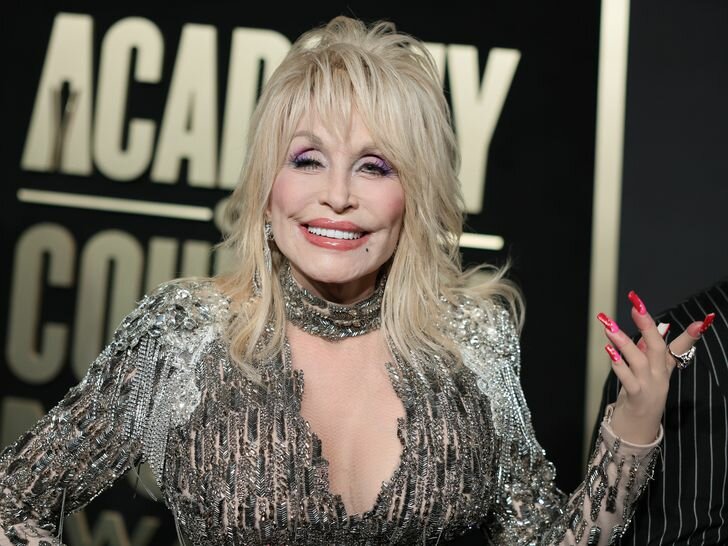 Dolly Parton attends the 58th Academy Of Country Music Awards in a sequined gown