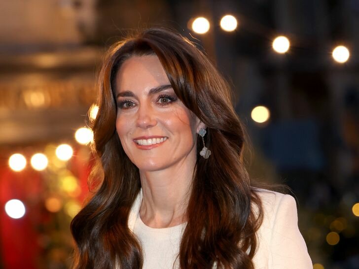 Kate Middleton Smiling Curled Hair White Coat The "Together At Christmas" Carol Service at Westminster Abbey 2023