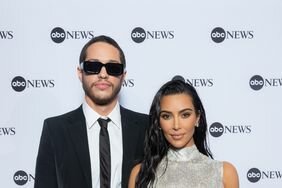 Pete Davidson and Kim Kardashian posing together in formalwear