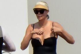 Charlize Theron Wore a Plunging One-Piece on Her Yacht