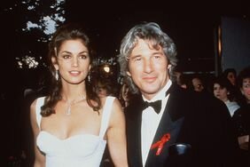 Cindy Crawford in a white gown alongside Richard Gere in a tux