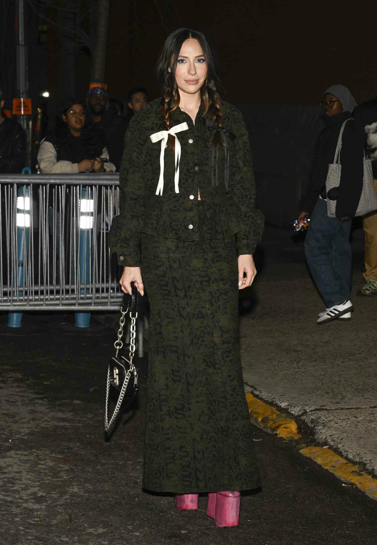 Tefi Pessoa wears a Marc Jacobs dress during NYFW, one of the best NYFW 2024 street style outfits. 