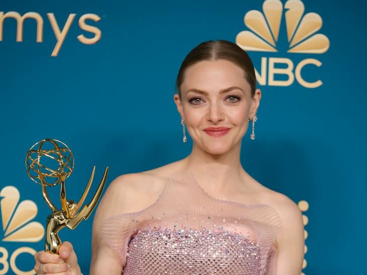 Amanda Seyfried Smiling Holding Emmy Award at 2022 Emmys