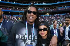 Jay-Z Smiling With Arm Around Blue Ivy at 2023 Super Bowl