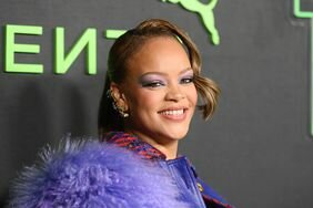 Rihanna Smiling Purple Fuzzy Coat at 2023 Fenty x Puma Creeper Phatty Launch Party 