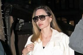 Angelina Jolie Ivory Trenchcoat Black Dress New York City June 26, 2023 Outing