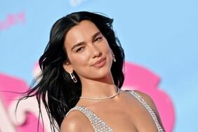 Dua Lipa attends the World Premiere of "Barbie" in a sparkly dress