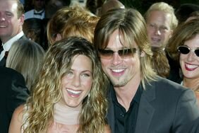 Jennifer Aniston and Brad Pitt arriving at the Shrine Auditorium in Los Angeles for the 54th Annual Primetime EMMY Awards 09/22/02