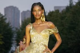 Wearing the best fashion trends from Spring 2024 NYFW, a model walks the Prabal Gurung Spring 2024 runway.