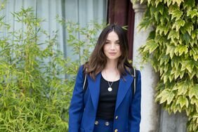 Ana de Armas in Front of Greenery in Blue Suit 79th Venice Film Festival