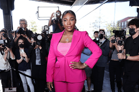 Serena Williams wearing pink suit on red carpet