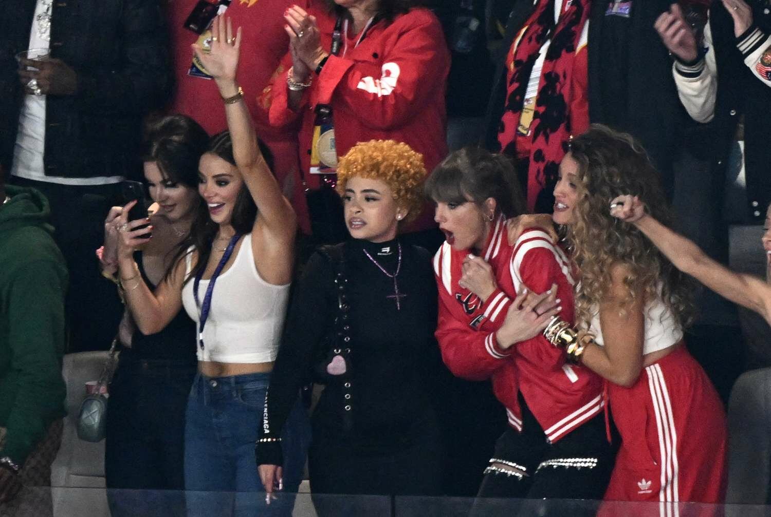 Taylor Swift, US actress Blake Lively, US rapper Ice Spice and US singer-songwriter Lana Del Rey (L) react during Super Bowl LVIII 