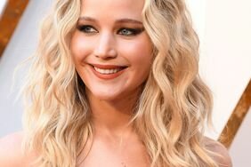 Photo of Jennifer Lawrence with blonde hair at the 90th Annual Academy Awards