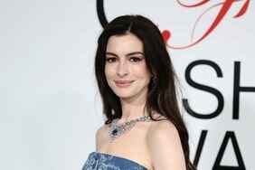 Anne Hathaway attends the 2023 CFDA Fashion Awards in a denim dress and diamond necklace