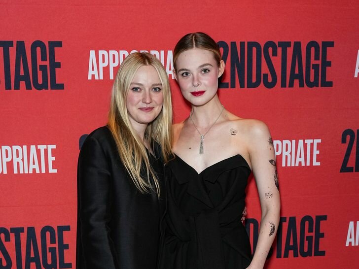 Dakota and Elle Fanning Matching Black Outfits Hands Around Each Other Second Stage Opening Night of "Appropriate" 