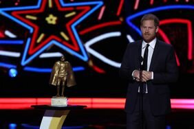 Prince Harry Hands Clasped Talking into Microphone Presenting Walter Payton Man of the Year Award at 2024 NFL Honors